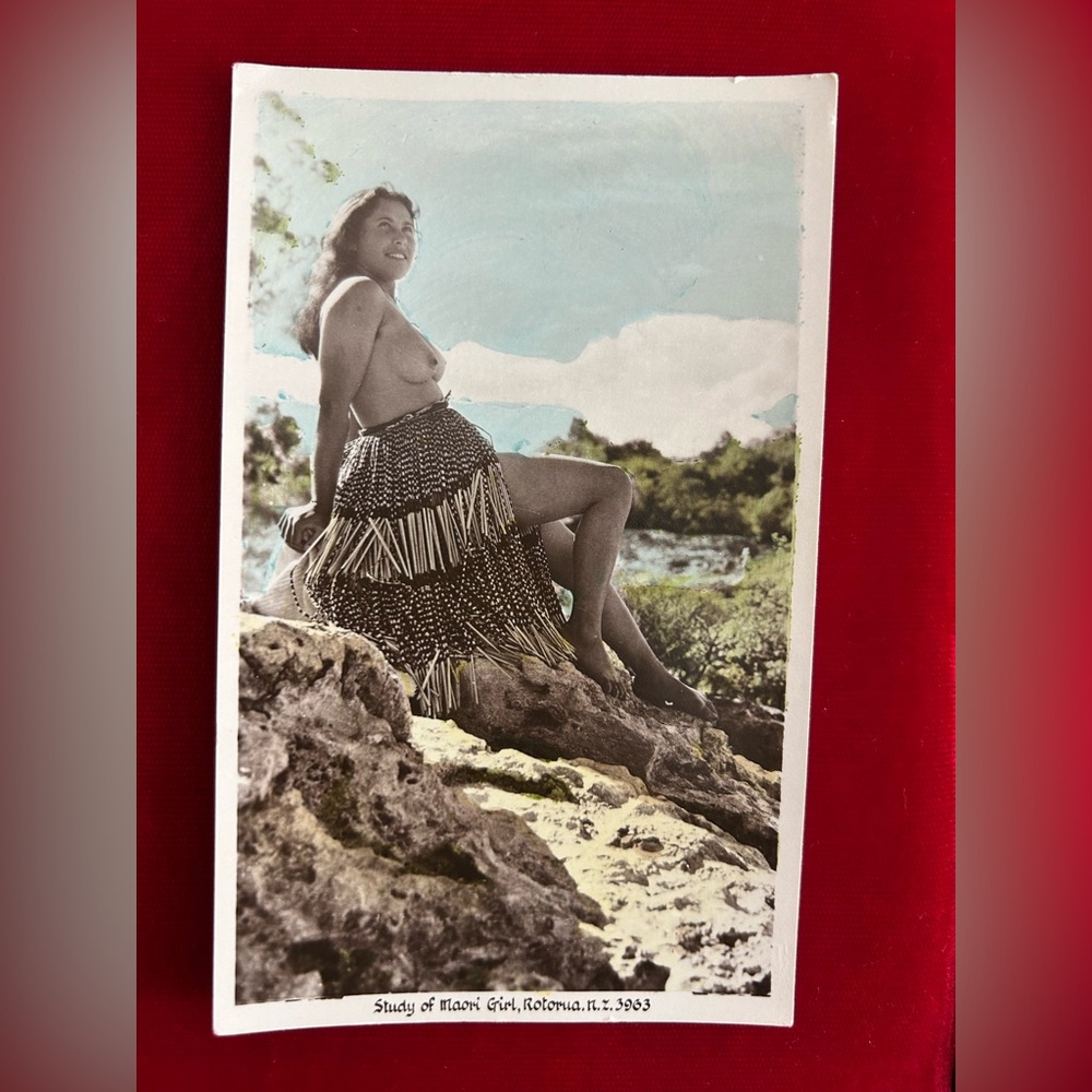 Vintage topless Māori maiden in traditional clothing postcard from New Zealand